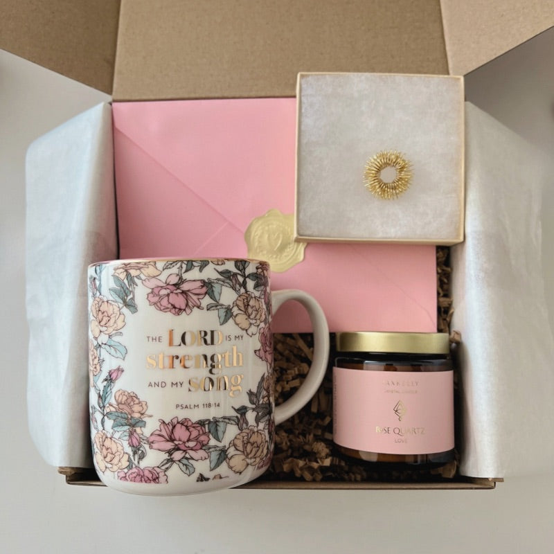 Inspirational mini gift box with floral mug, gold acupressure ring, crystal candle, and affirmation card