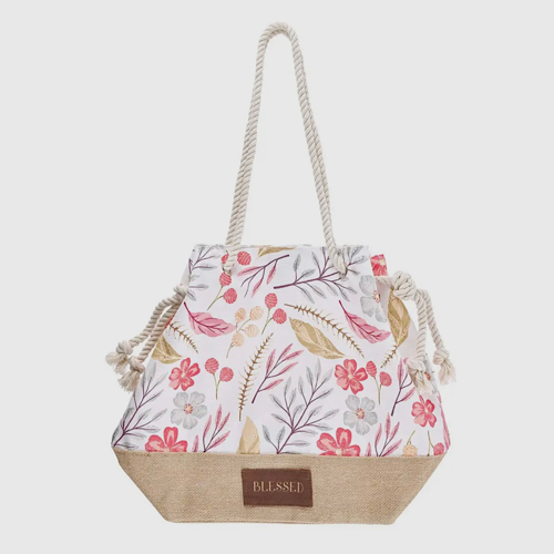 Tan floral canvas tote with rope handles and “Blessed” design, roomy faith-inspired carryall bag
