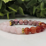 8mm beaded crystal bracelet with Rose Quartz, Carnelian, and Rhodonite to encourage self-love, confidence, and emotional healing