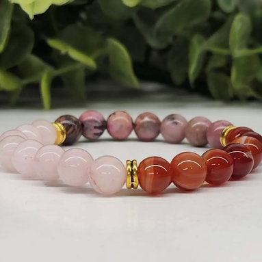 8mm beaded crystal bracelet with Rose Quartz, Carnelian, and Rhodonite to encourage self-love, confidence, and emotional healing