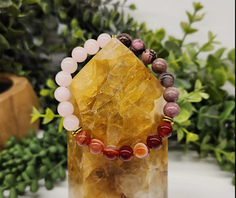 8mm beaded crystal bracelet with Rose Quartz, Carnelian, and Rhodonite to encourage self-love, confidence, and emotional healing