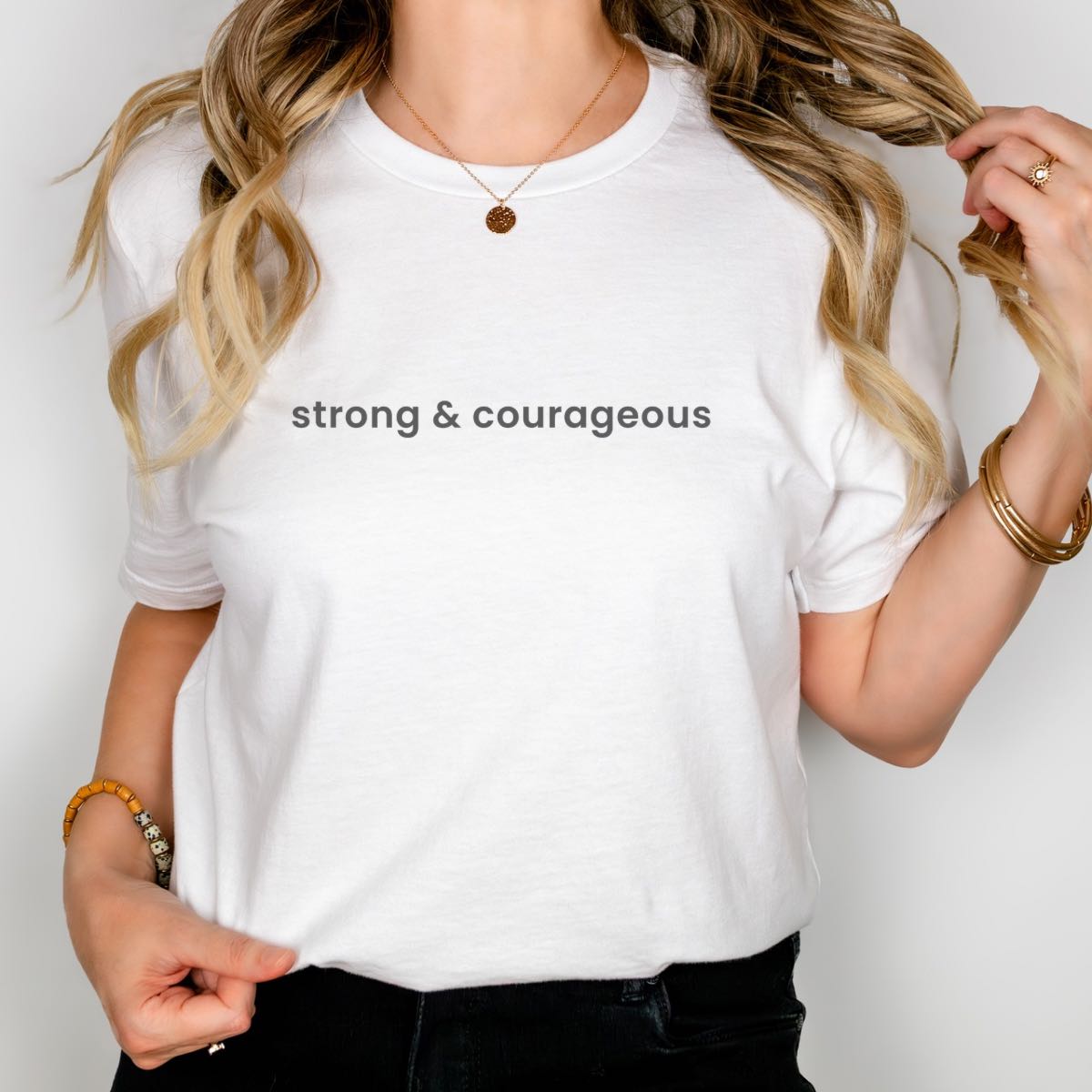 Christian scripture t-shirt with “Strong & Courageous” design from Joshua 1:9