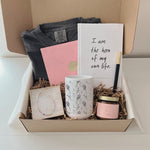 Support healing and self-love with this thoughtful gift set—includes journal, gemstone bracelet, lavender tee, rose quartz candle & mug.
